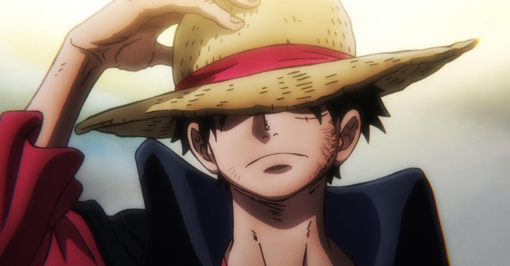 Monkey D. Luffy adjusting his straw hat in One Piece