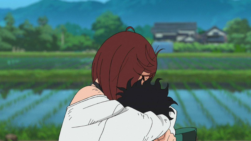 Momo Ayase embracing Ken Takakura Okarun in DAN DA DAN